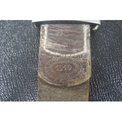 World War II WH troop buckle, iron model, leather flap marked 1940
