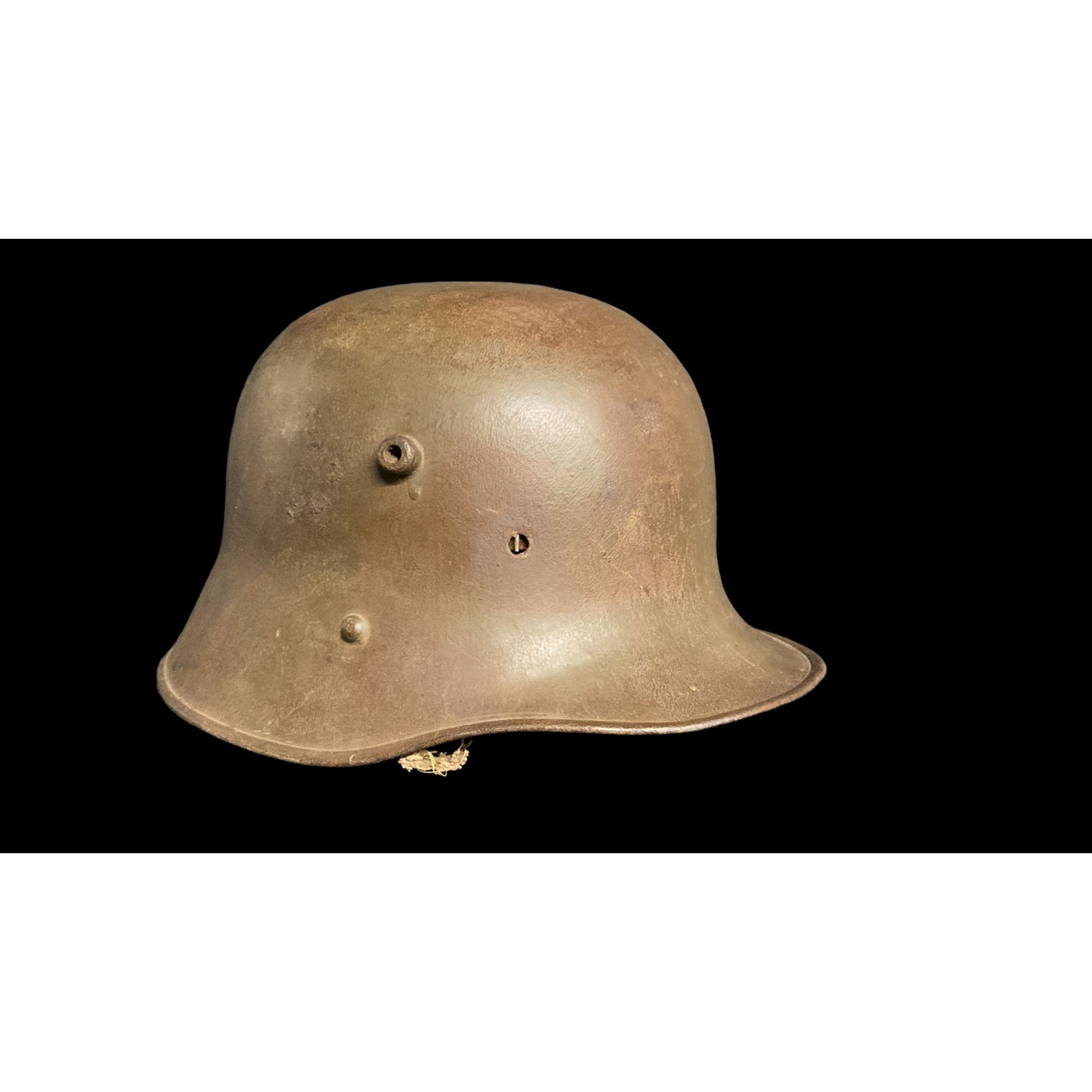 Austrian helmet M17 100% color, chinstrap cut, one front rivet is missing