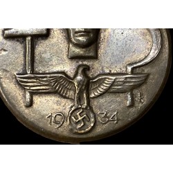 Tinnie TAG DER ARBEIT 1934 , stamped sheet metal