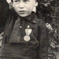 Portrait photo of a Balilla with the March on Rome medal