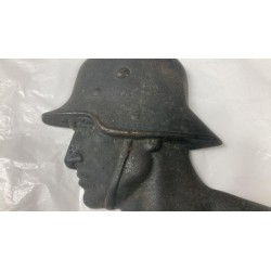 Profile of a German soldier with helmet, 1930s/40s, cast iron