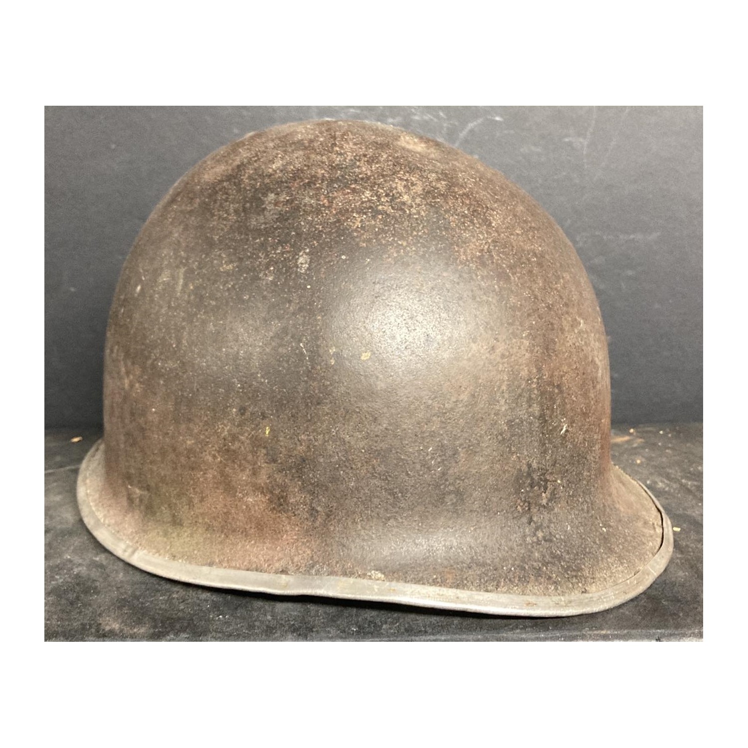 WWII  M1 helmet fixed hooks with rear emblem, liner missing