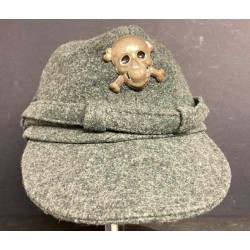 Gray-green M44 Black Brigade RSI cap, in wool cloth with a printed metal skull