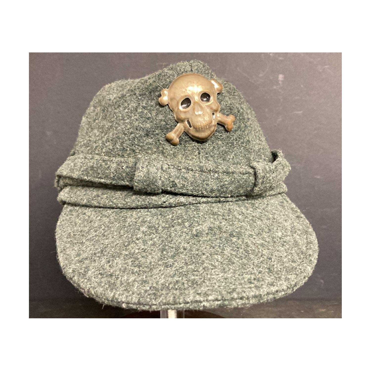 Gray-green M44 Black Brigade RSI cap, in wool cloth with a printed metal skull