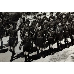 very rare photo of a group of Balilla members of the San Marino Fascist Party marching with banners and pennants