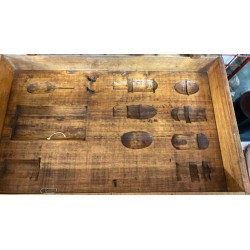 Wooden box for educational use containing inert bombs for schools