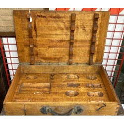Wooden box for educational use containing inert bombs for schools