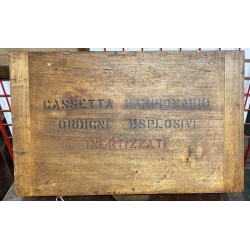 Wooden box for educational use containing inert bombs for schools