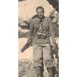 Large-format photograph of a soldier of the Royal Italian Army in a war zone in East Africa
