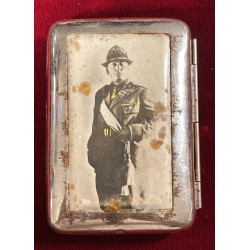 Pill box, metal cigarette case and lithographed photo of the Duce