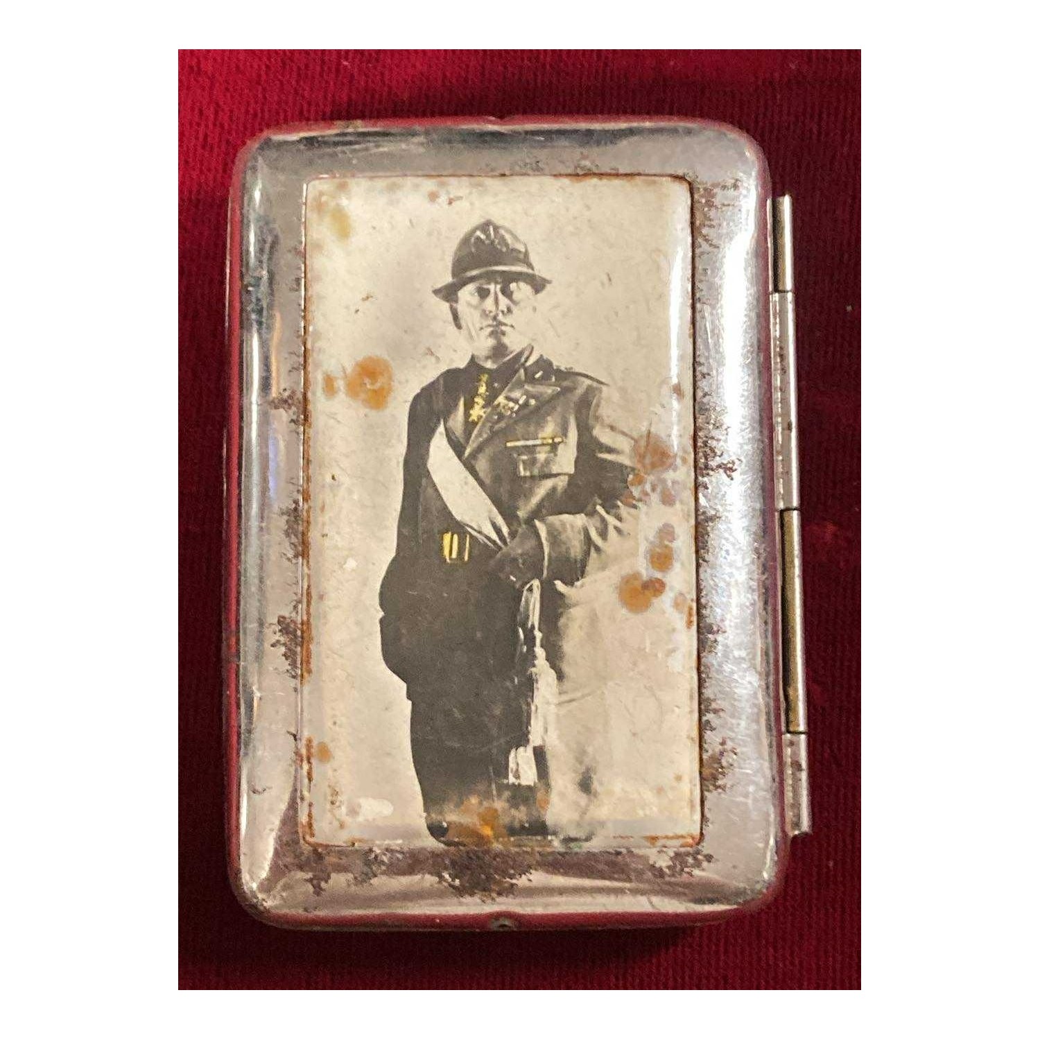 Pill box, metal cigarette case and lithographed photo of the Duce