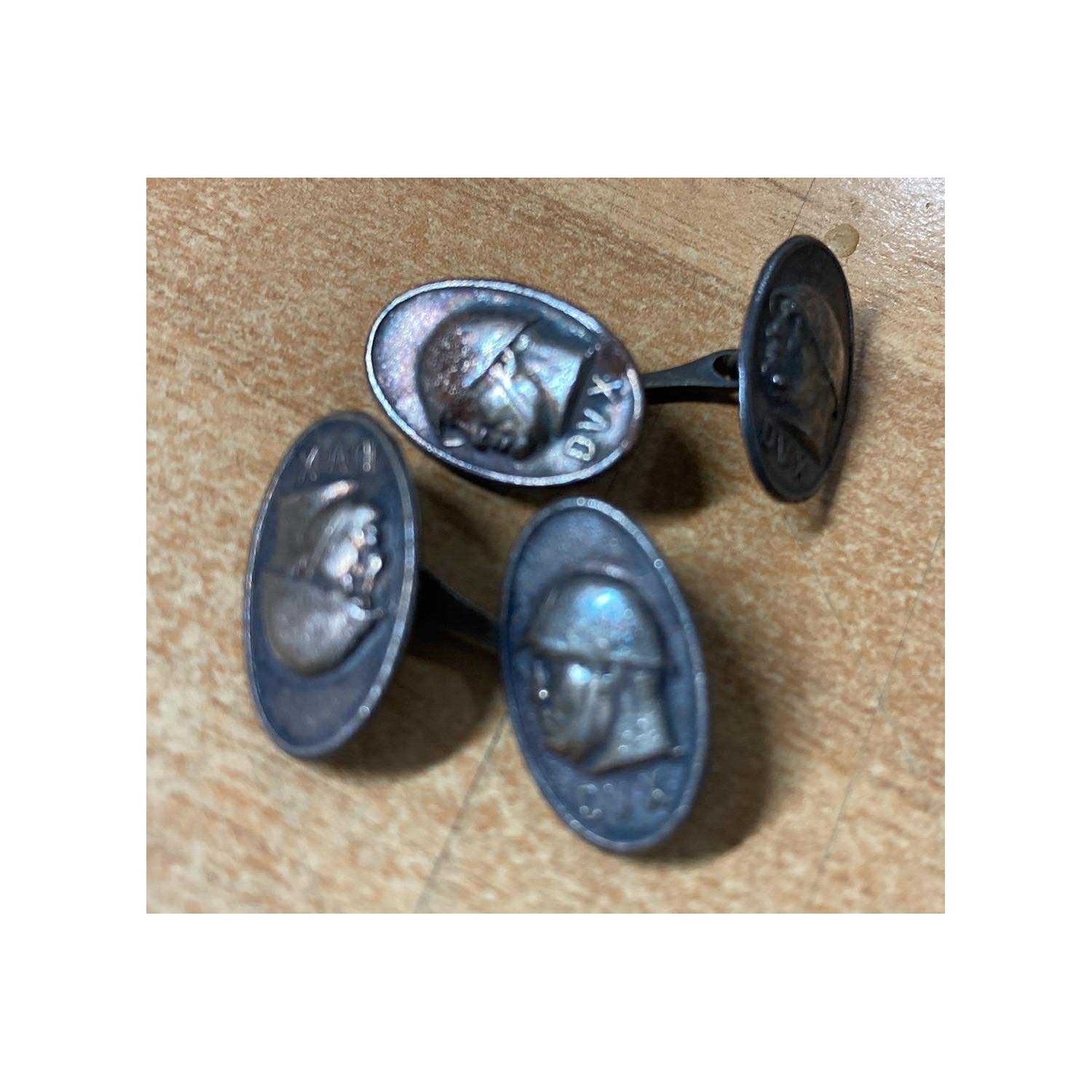 Pair of cufflinks from the 1930s, fascist propaganda with the effigy of the Duce, made of autarchic material