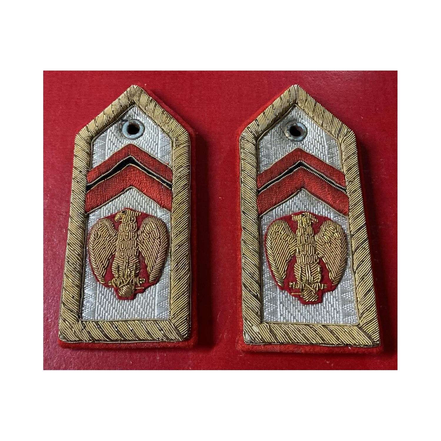 A true rarity. A stunning pair of shoulder boards for the gray-green uniform of the First Honorary Corporal of the Militia.