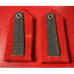 A true rarity. A stunning pair of shoulder boards for the gray-green uniform of the First Honorary Corporal of the Militia.