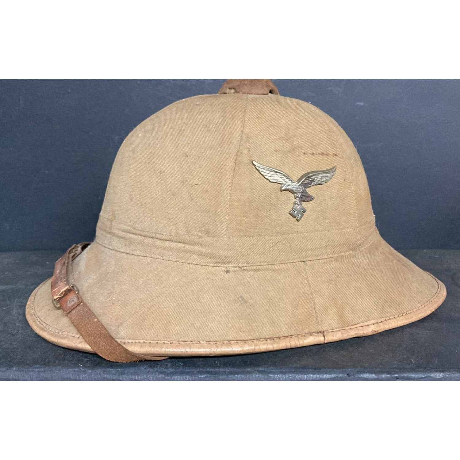 Luftwaffe tropical helmet marked F.ST.L. and dated 1943