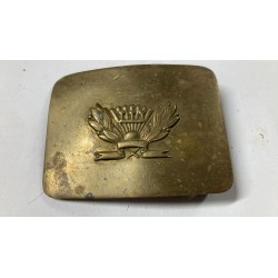 A brass belt buckle for Soviet students, used until 1962