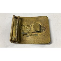 A brass belt buckle for Soviet students, used until 1962