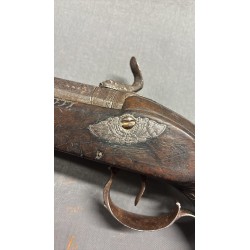 Engraved muzzle-loading pistol