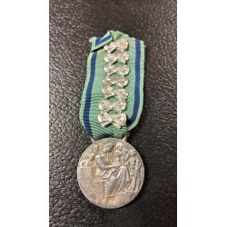 Medal for Mothers of Large Families: 7 ribbons, 7 children