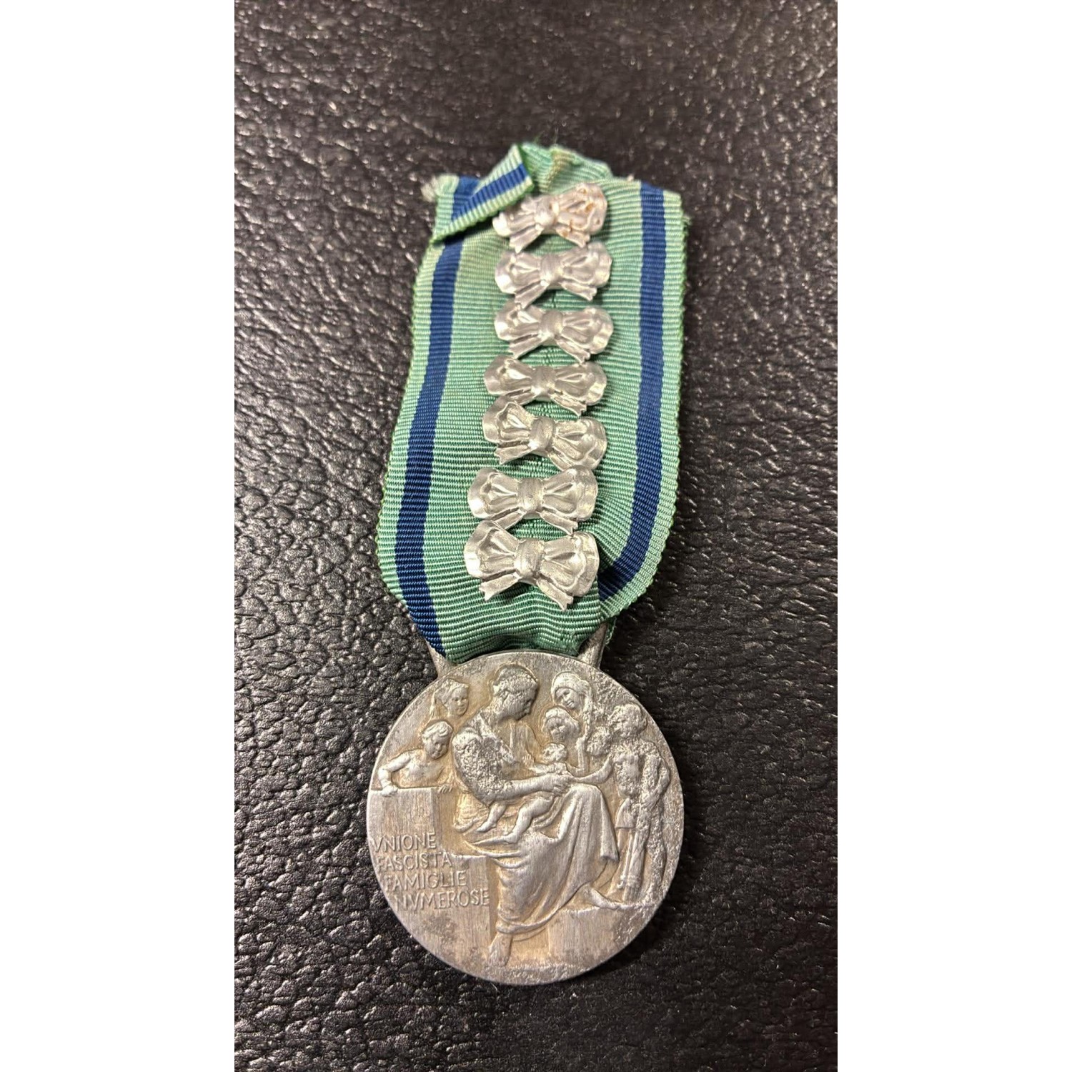 Medal for Mothers of Large Families: 7 ribbons, 7 children