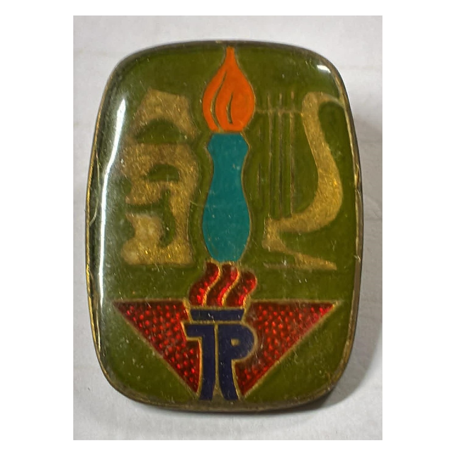 Badge of the German Democratic Republic (GDR), specifically associated with the Ernst Thälmann Pioneer Organization