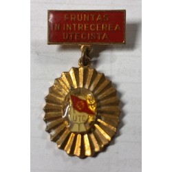 spilla rumena dell'era comunista "Fruntaș în întrecerea utecistă"